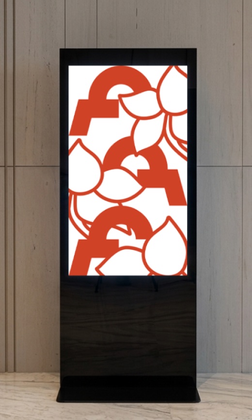 Freestanding display panel showing a red abstract Georgian graphic on black