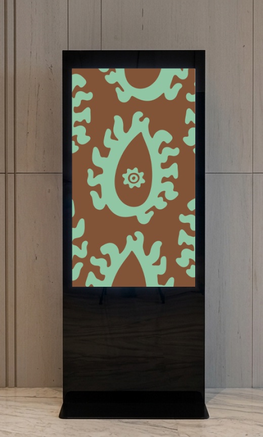 Freestanding display panel showing a green ornamental Georgian graphic on black